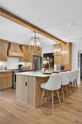 Culinary excellence awaits in this kitchen featuring an oversized island.