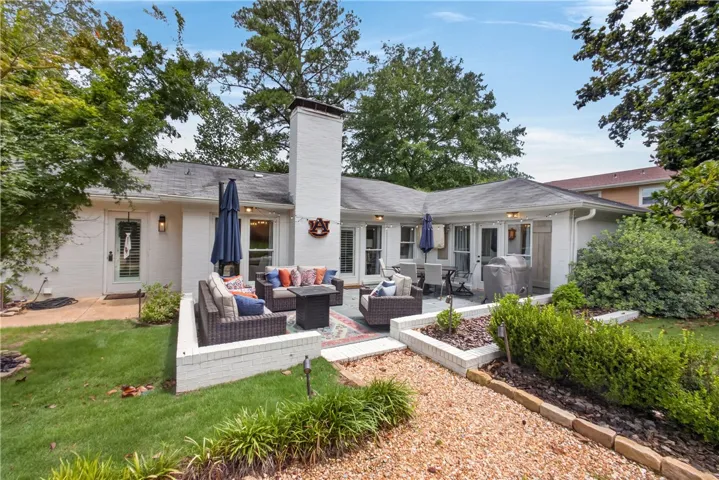 A spacious backyard patio provides an inviting retreat for outdoor relaxation and entertaining.