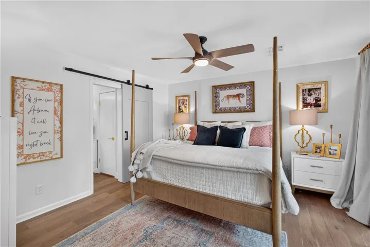 Relax in this inviting primary bedroom, offering ample space and serene comfort for peaceful nights.