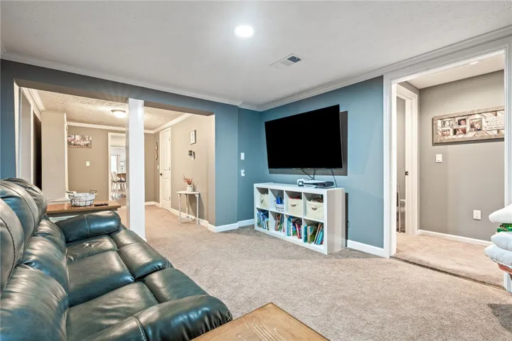 A comfortable living space provides a seamless transition to other areas of the home.