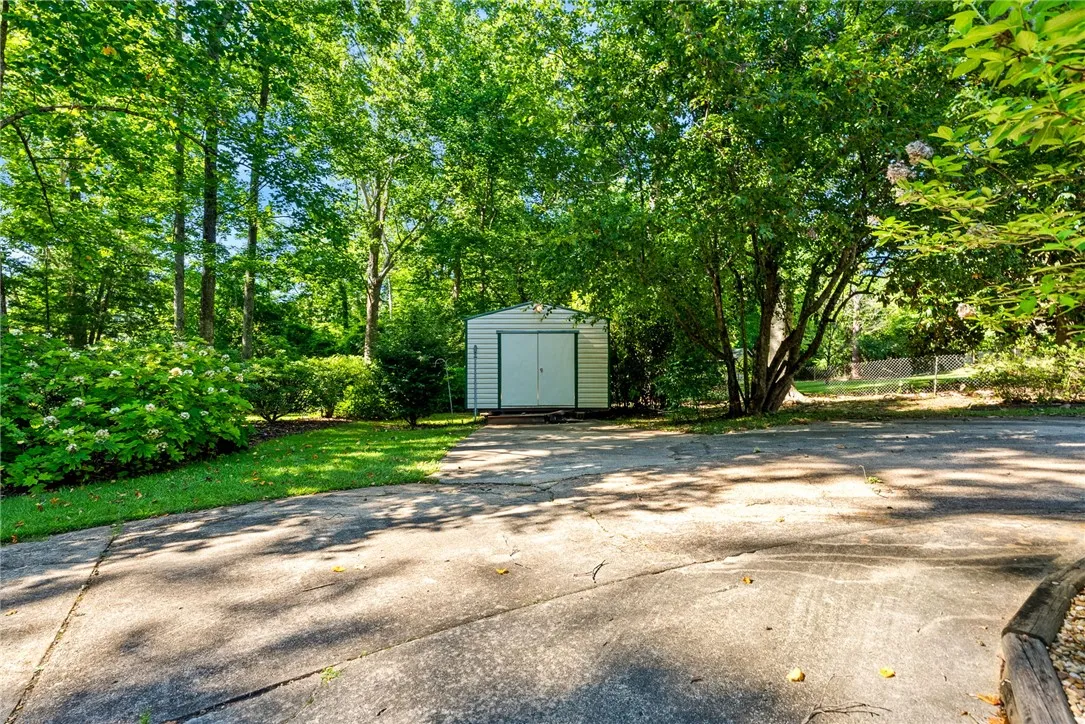Work shed off of driveway with electricity