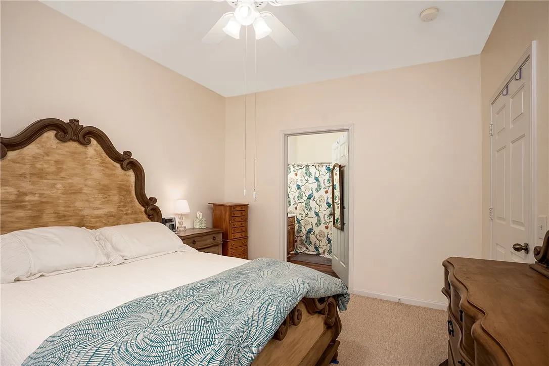 Comfortable bedroom with an attached bath.