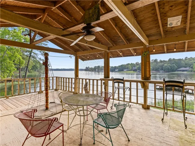 Relax in this tranquil covered patio, offering exceptional water views from the comfort of your own outdoor retreat.