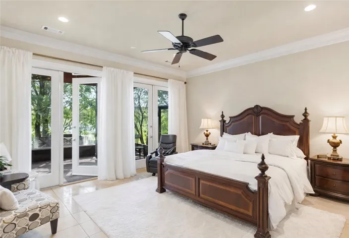 Retreat to this tranquil primary suite with direct access to an outdoor sanctuary.