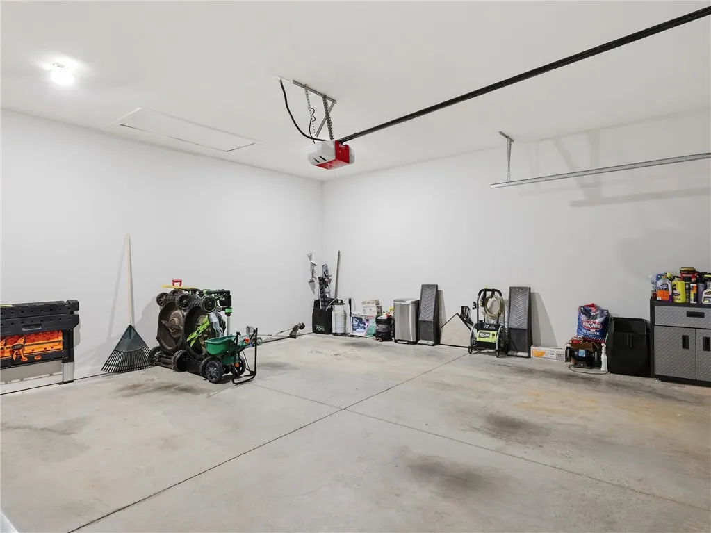 A spacious and functional garage provides ample storage and utility space.