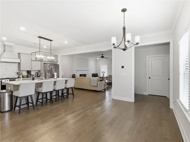 An open concept design seamlessly connects the kitchen and living area, perfect for entertaining.
