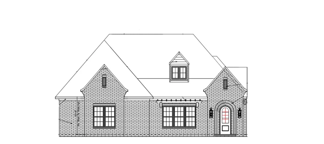 A classic brick facade with dormer windows and a stately arched entry, exemplifying enduring architectural appeal.