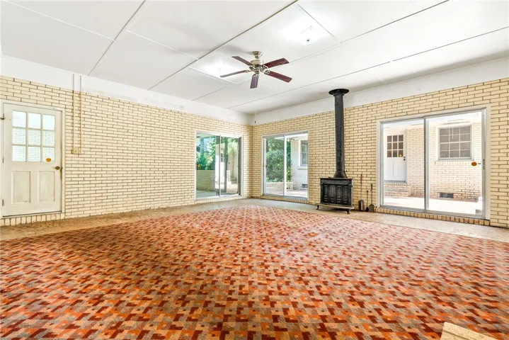 Huge Sun Room with Fireplace