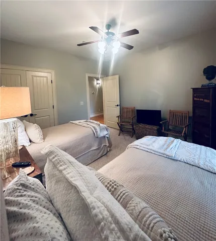 Restful bedroom retreat, offering comfortable sleeping arrangements and direct access to amenities.