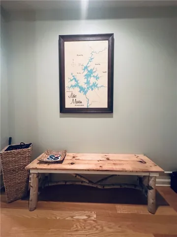 Hardwood floors and light wall tones provide a neutral canvas for personalization.