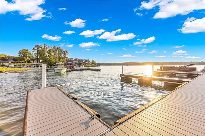Boasting direct lake access with a private boat slip, this waterfront setting is an aquatic dream.