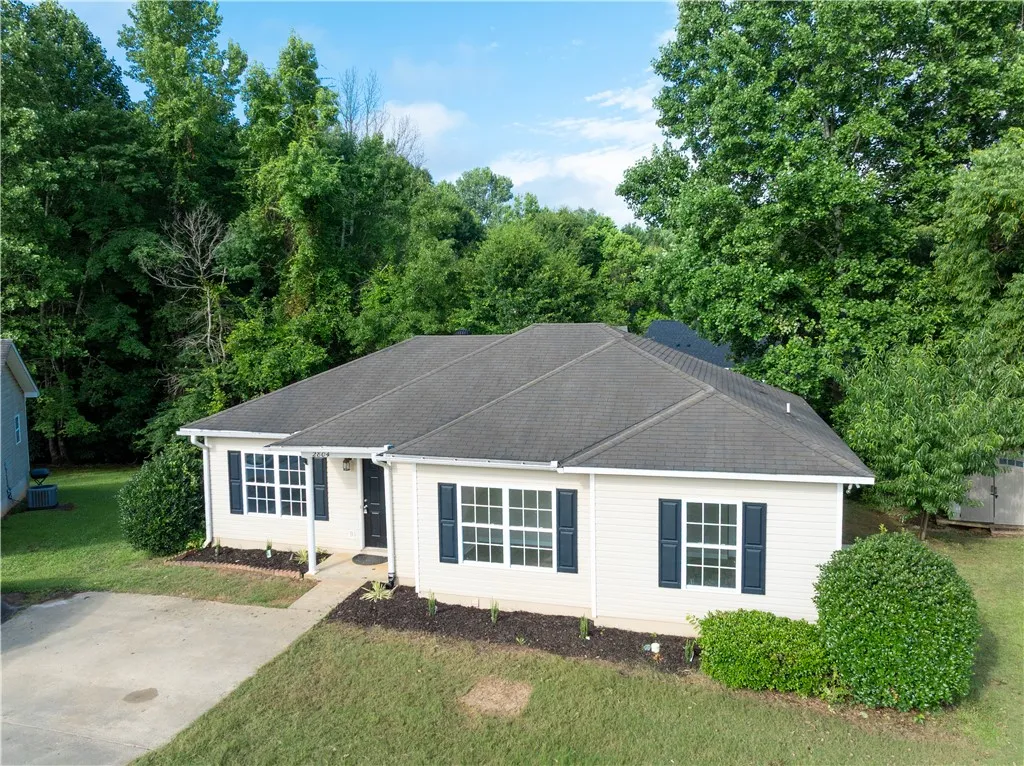 This home has been remodeled with new flooring, paint, fixtures, appliances, hot water heater, counters and commodes.