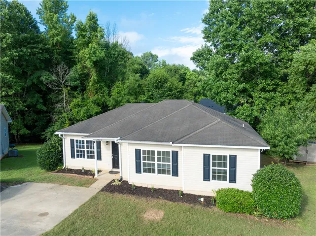 This home has been remodeled with new flooring, paint, fixtures, appliances, hot water heater, counters and commodes.