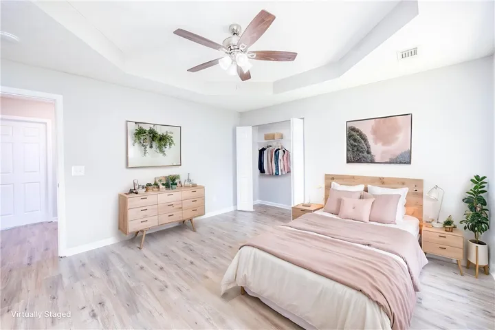 This virtual staging allows you to envision your furniture in the primary bedroom at 2804 Southview Court in Opelika.