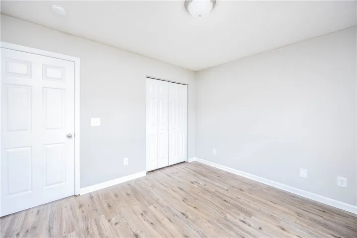 LVP flooring graces this versatile room, offering clean lines and modern appeal.