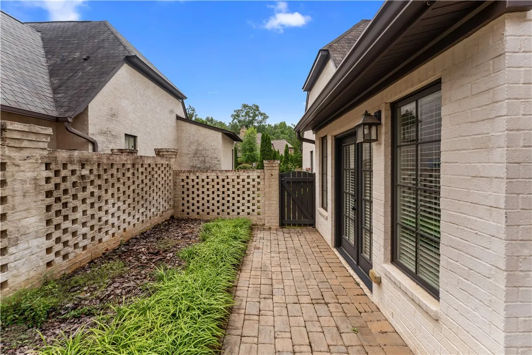 A private outdoor patio with paver flooring provides a tranquil retreat.