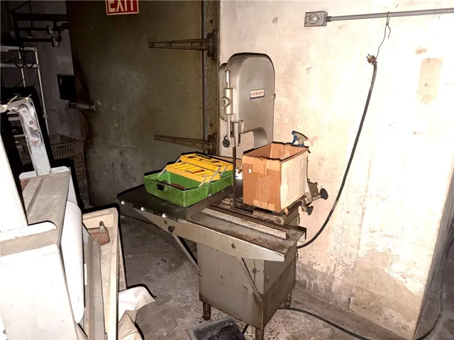 This workshop features concrete flooring and a robust work surface.