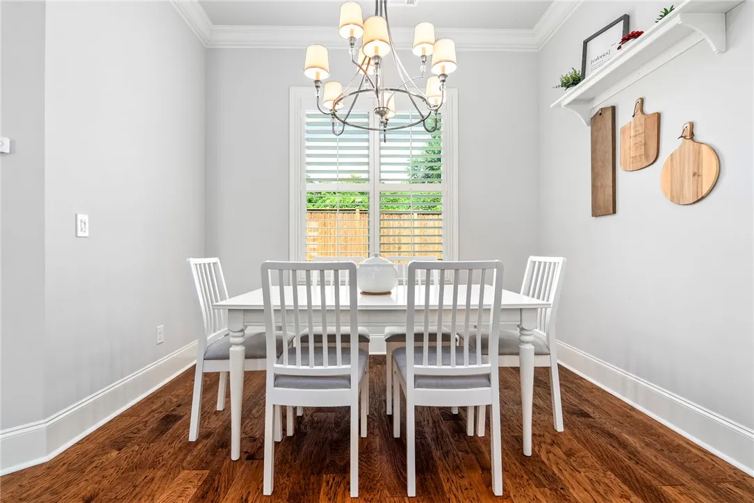 The sunny breakfast room is perfectly suited for casual meals and morning coffee.