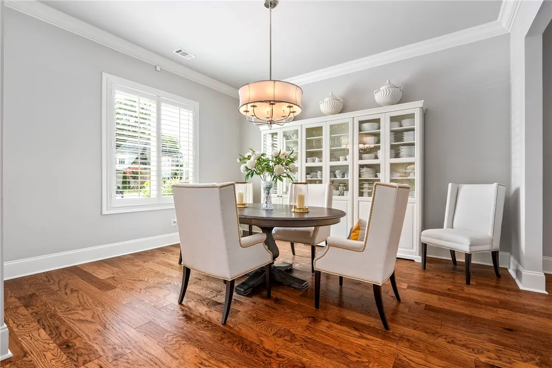Positioned just off the entry, the formal dining room offers a classic space for entertaining.