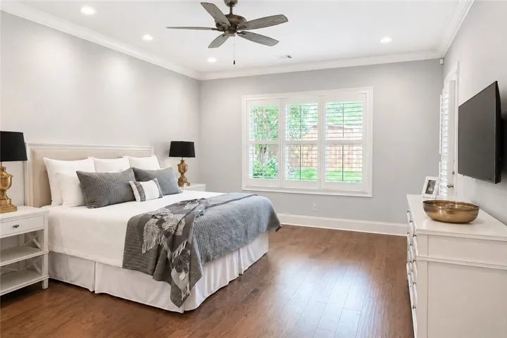 Private access to the covered porch enhances the comfort and tranquility of the primary suite.