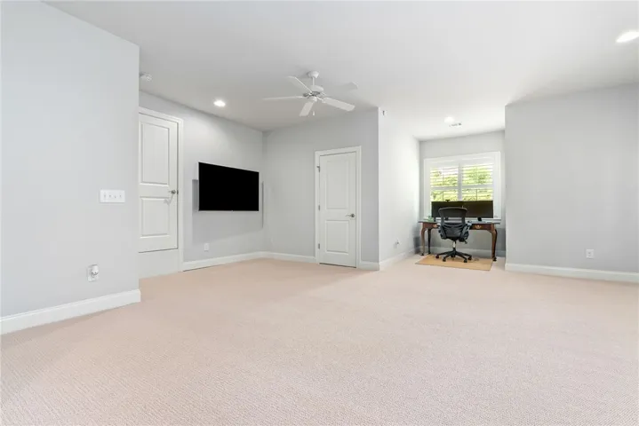 The oversized bonus room offers exceptional flexibility, easily accommodating a media room, playroom, fitness studio, home office, game room, or multiple uses at once.