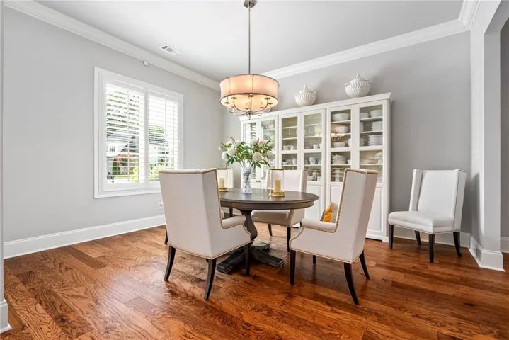 Positioned just off the entry, the formal dining room offers a classic space for entertaining.