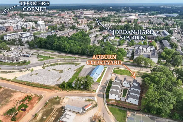 An aerial perspective reveals the strategic placement of new construction within a bustling urban landscape.