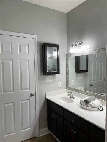 A well-appointed bathroom features a contemporary double vanity with dual sinks and ample counter space.