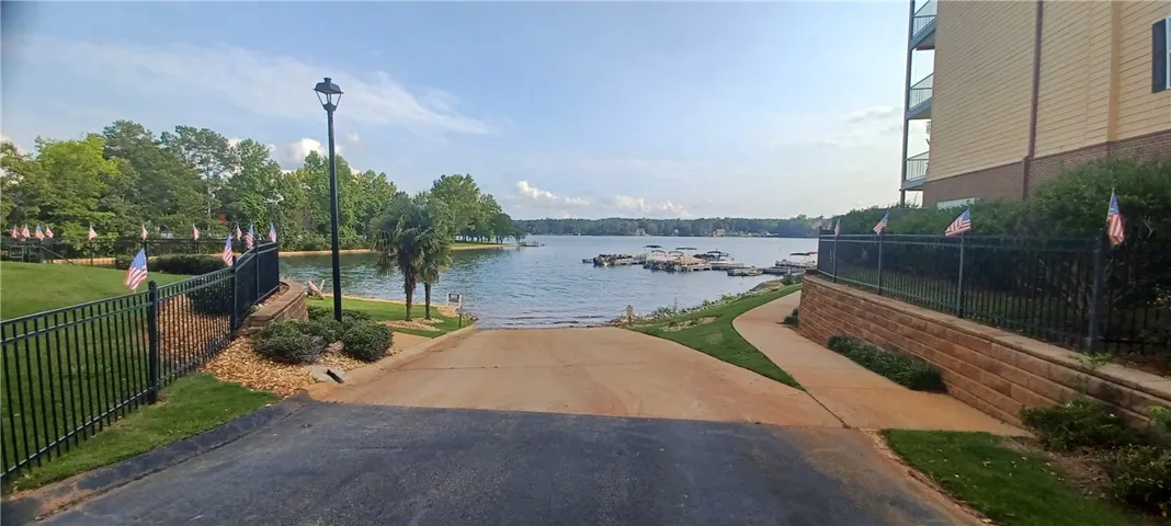 A picturesque lakefront community offers exclusive boat access and serene water views.