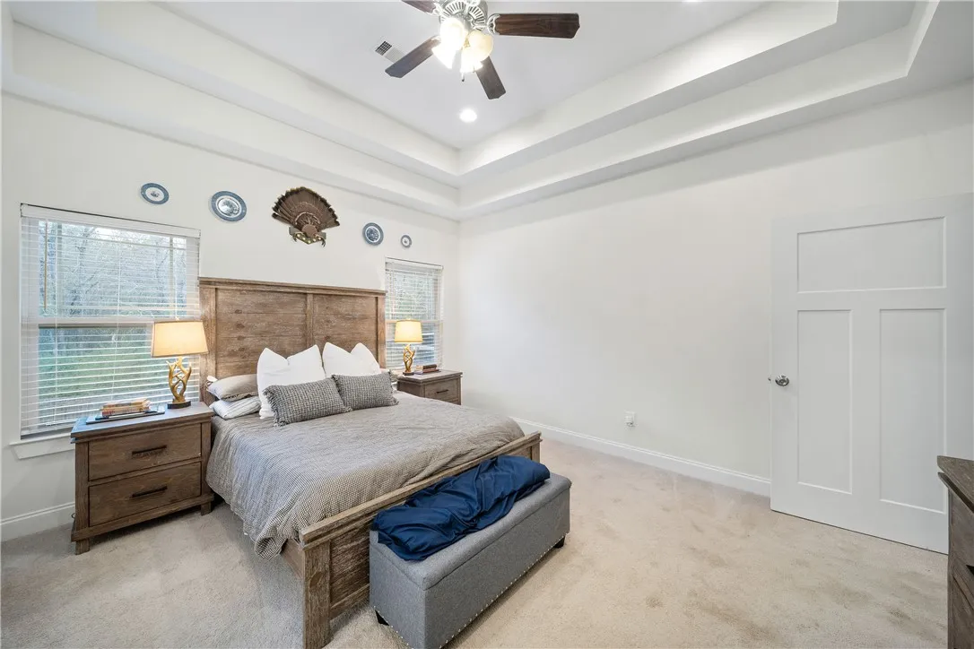 A primary bedroom offering ample space for rest and rejuvenation.