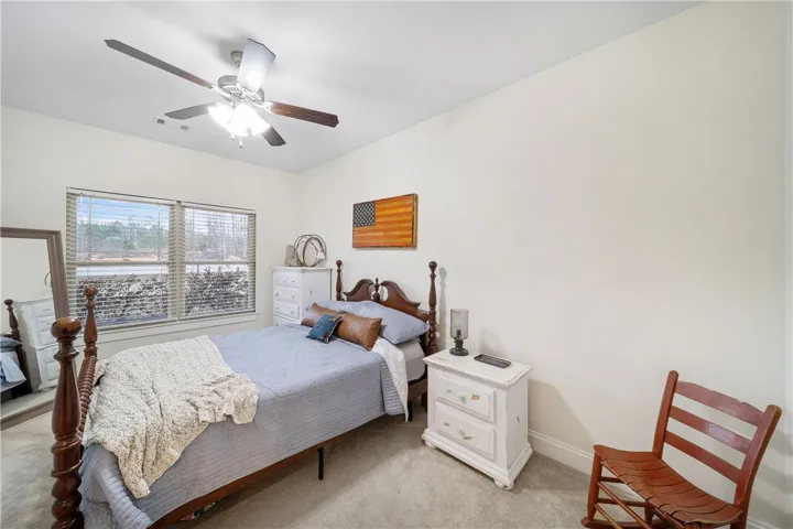 A quiet retreat, this bedroom offers a restful atmosphere for peaceful slumbers.