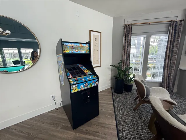 Inviting recreation space with well-lit windows.