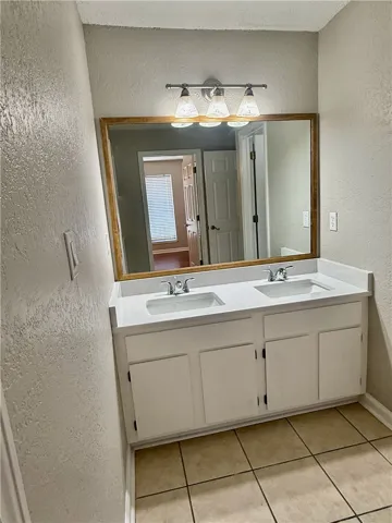 A well-appointed bathroom vanity with dual sinks, perfect for shared routines.