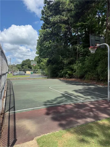 Enjoy outdoor recreation with a well-maintained basketball court, ready for play.