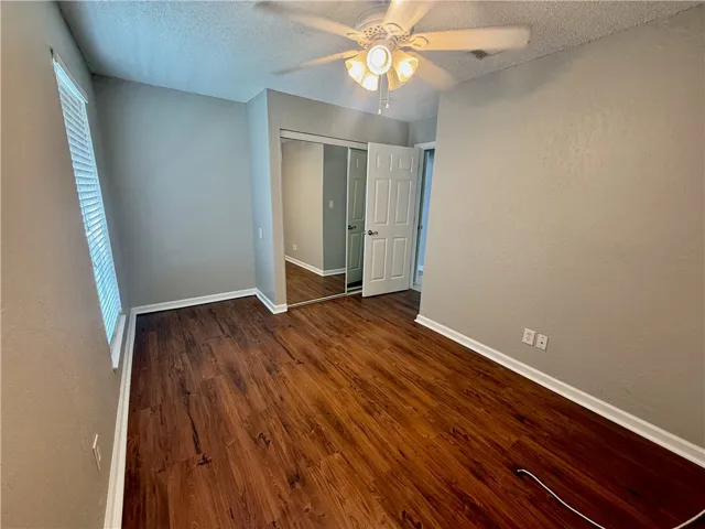 The bedrooms have wood-look flooring, ample closet space and a nook that's perfect for a desk or chest of drawers.