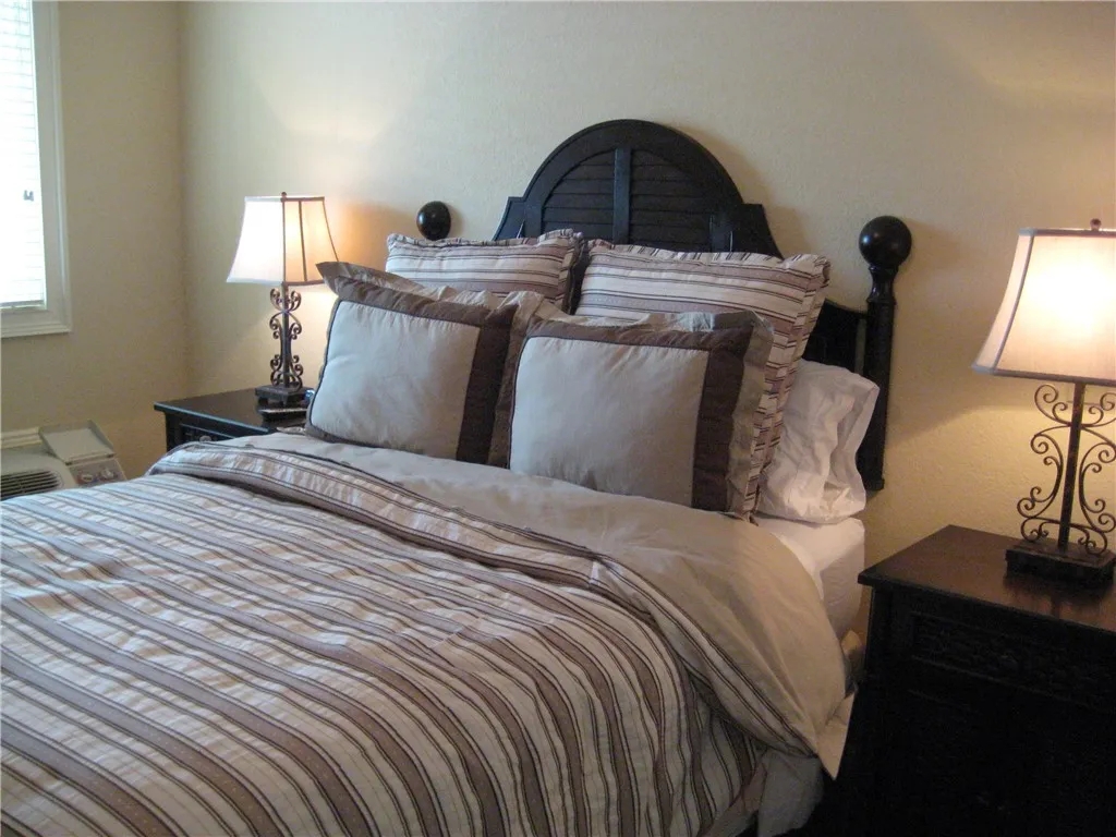 A quiet retreat, this bedroom offers a serene atmosphere for relaxation.