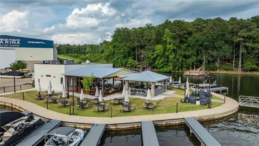 Boasting waterfront dining and private docks, this property is ideal for lakeside leisure.