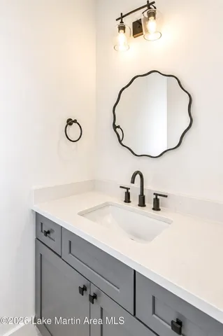 half bathroom located off of kitchen