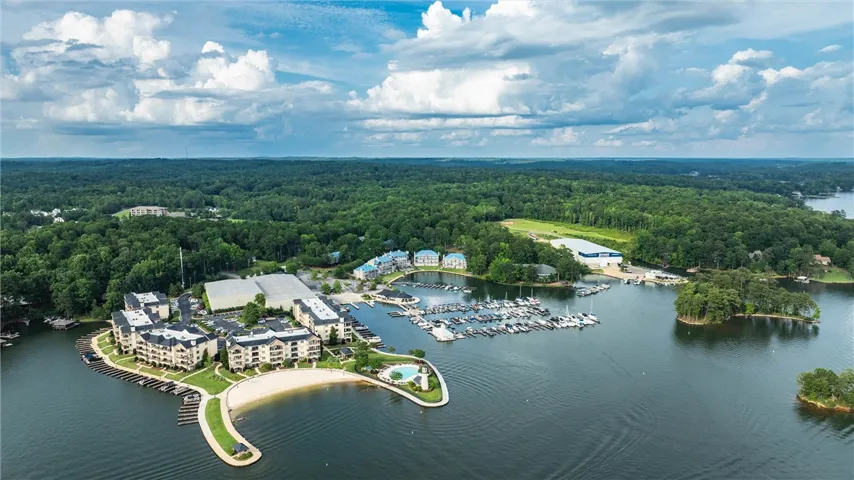 Discover a scenic lakeside community with private marina, sandy beach, and resort-style pool.