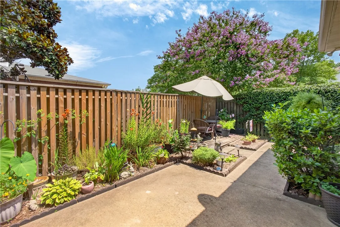 A tranquil private outdoor retreat, perfect for relaxation and gardening, awaits.