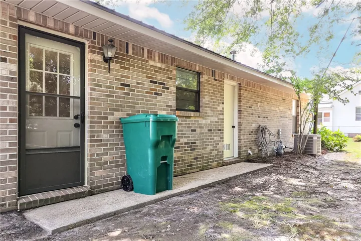 A durable brick exterior offers practical, low-maintenance living.