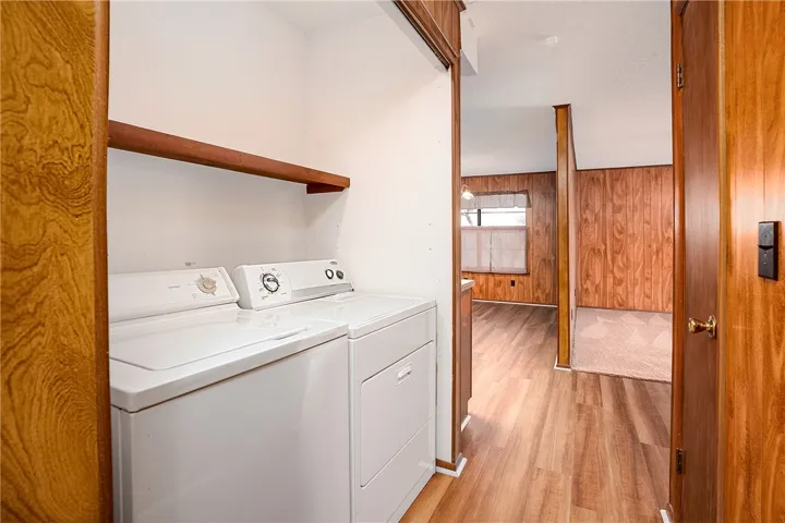 A dedicated laundry space provides household convenience, complete with a washer and dryer.