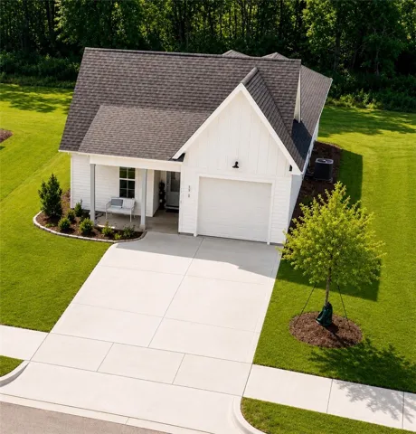 Well-maintained grounds enhance the curb appeal of this charming residence.