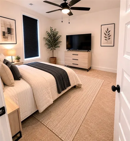 Restful bedroom retreat with a cozy ambiance and practical appointments for ultimate comfort.