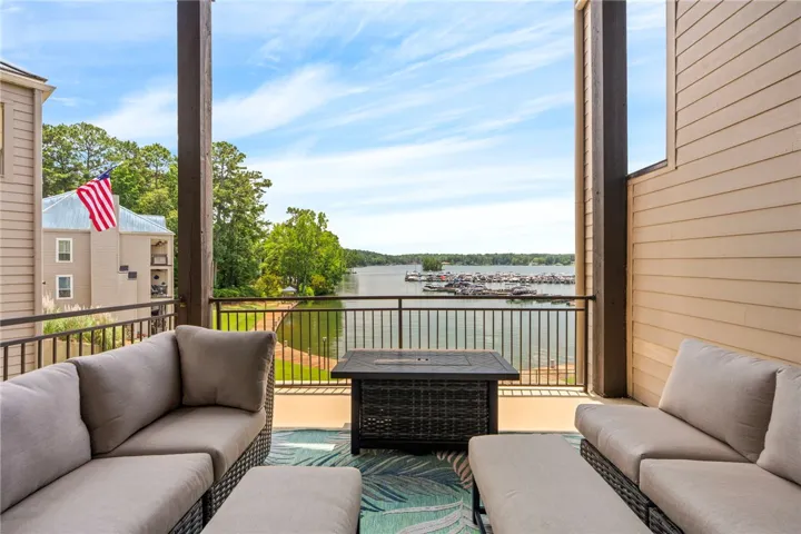 Enjoy water views from a comfortable covered deck, perfect for peaceful mornings or vibrant evenings.