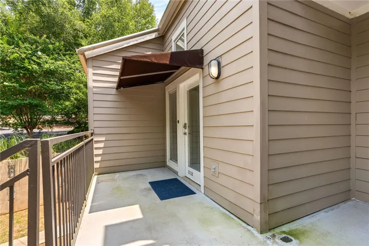 A welcoming entry patio provides an inviting transition to this home's private space.