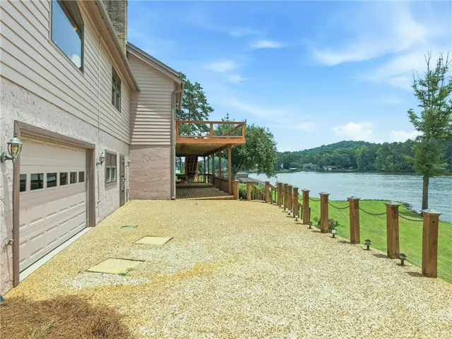 Just outside the one car garage is the lower deck.  This area is perfect for grilling or just enjoying the view.