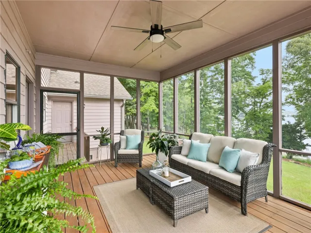 The screened in porch also offers a catwalk with access to the garage.