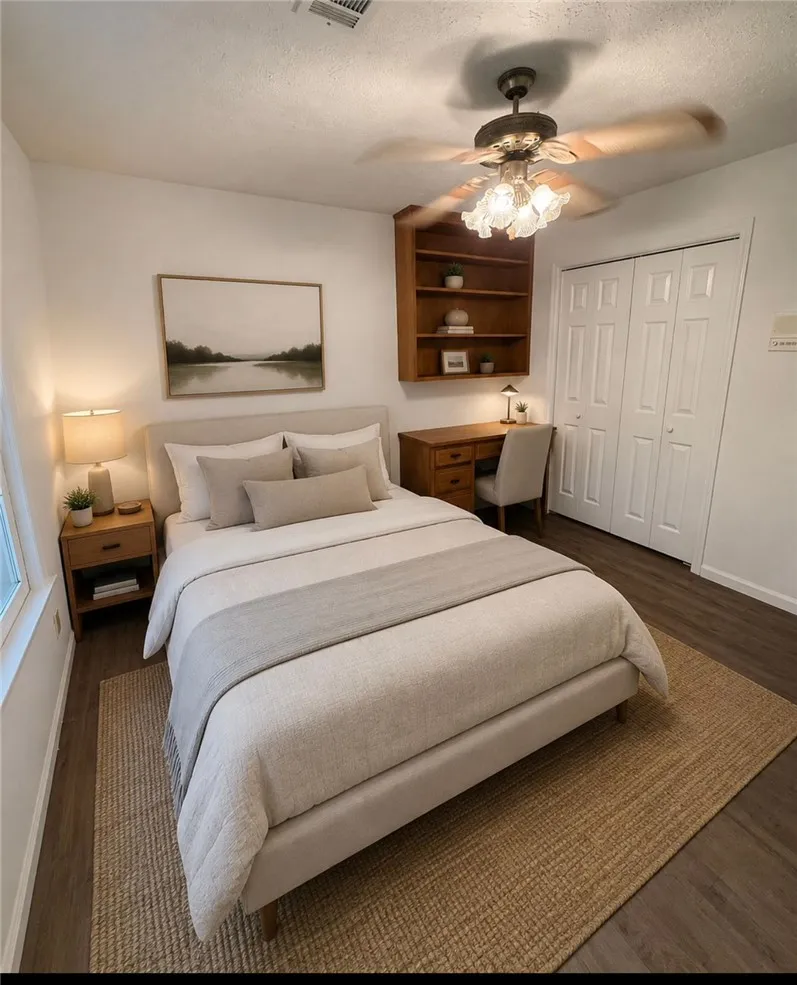 Well-lit sleeping quarters with a built-in bookshelf and ample storage options.