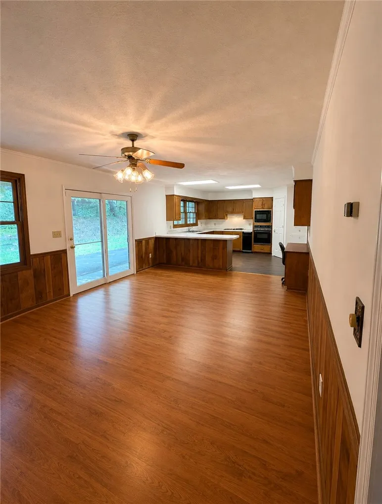 An inviting open-concept layout connects living space with a well-appointed kitchen.